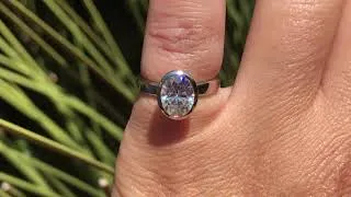 Oval Moissanite Peekaboo Bezel Solitaire Engagement Ring